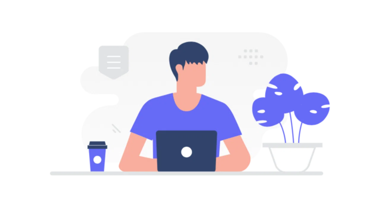 デスクでノートPC作業をする男性のイラスト